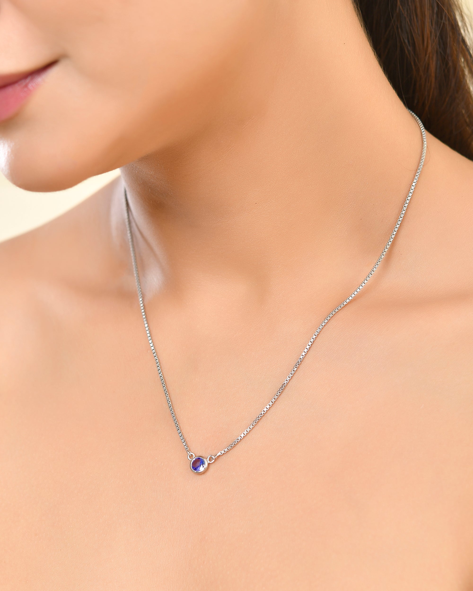 Bezel Set Round Tanzanite Solitaire Pendant with Box Chain