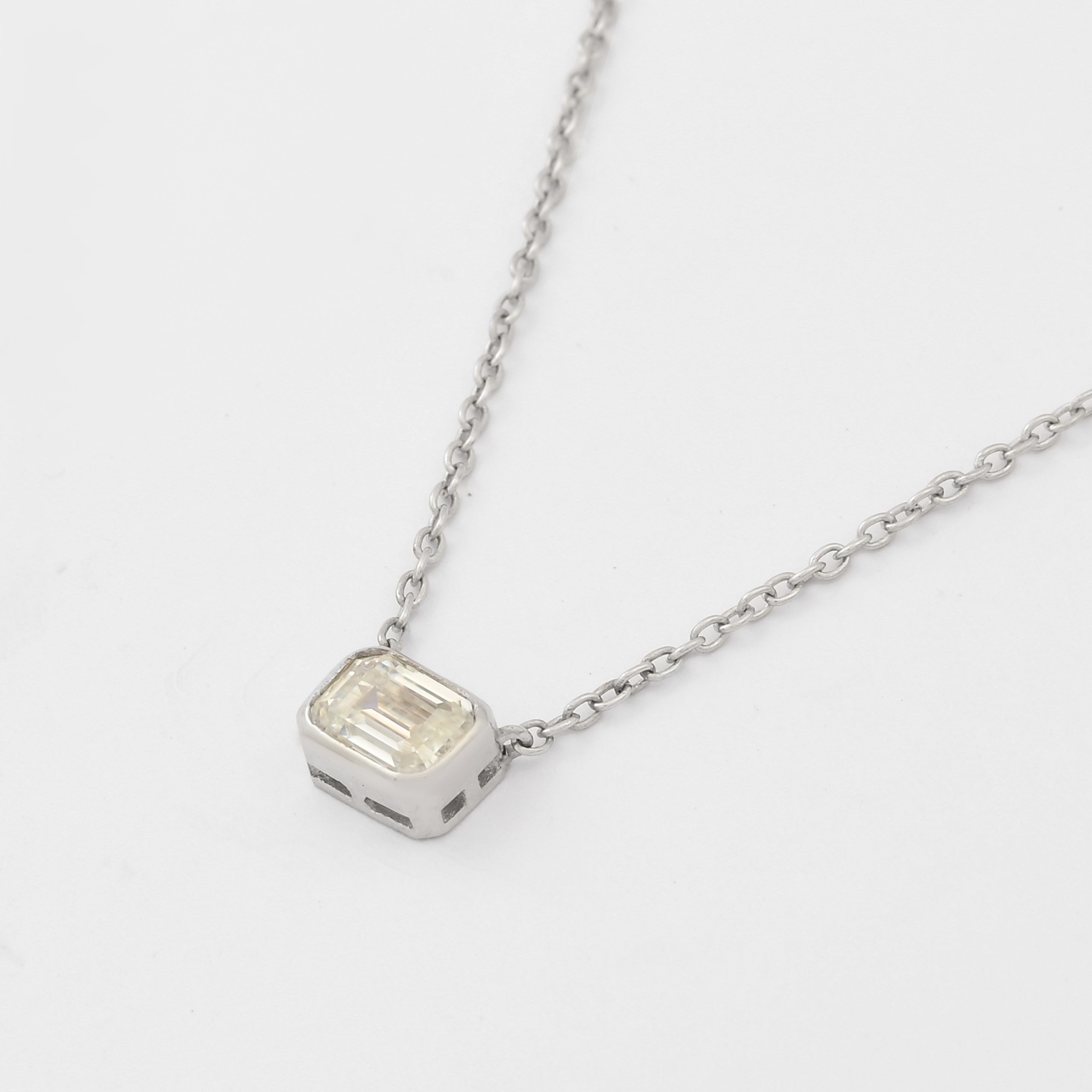 Bezel-Set Emerald Cut Moissanite Solitaire Pendant