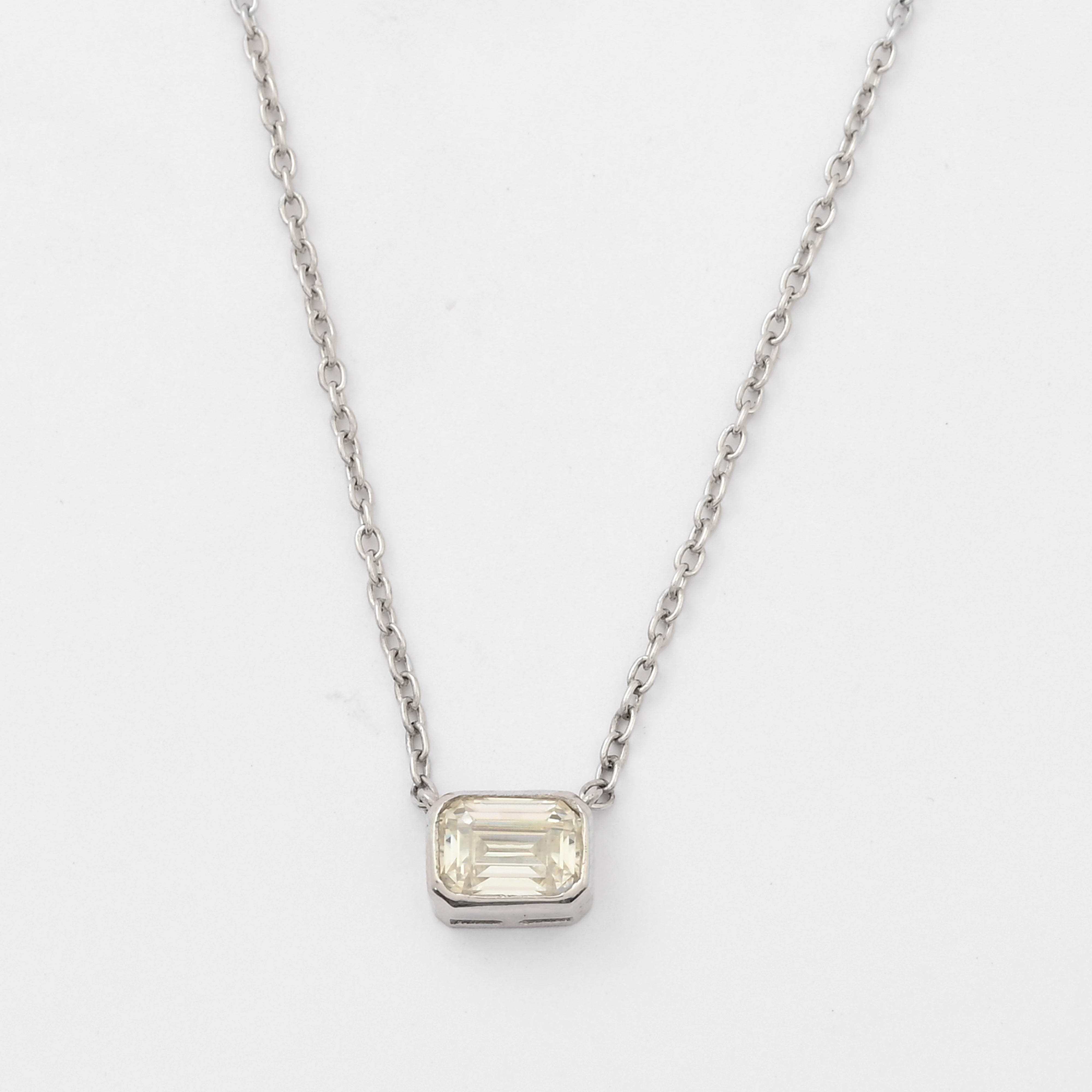 Bezel-Set Emerald Cut Moissanite Solitaire Pendant