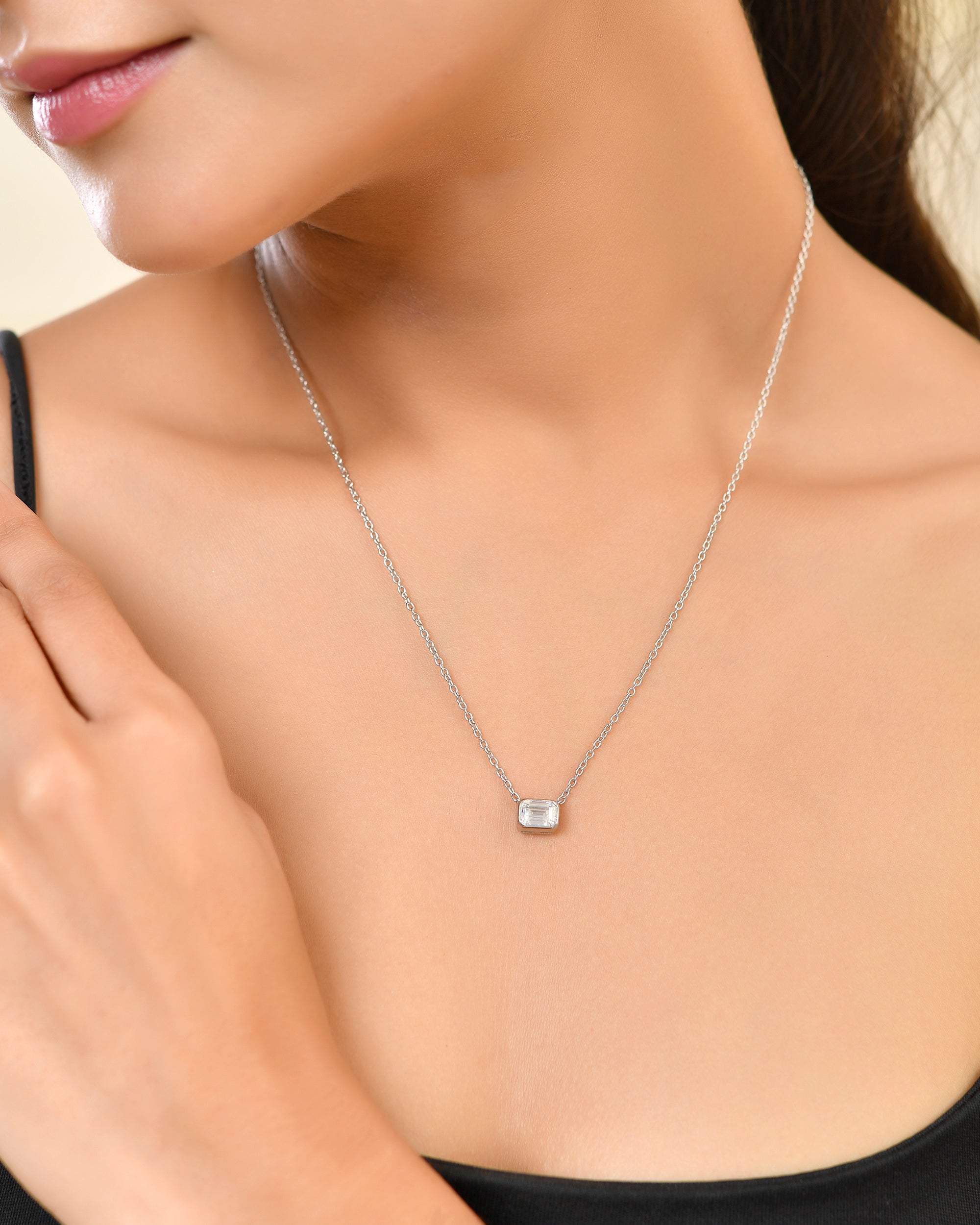 Bezel-Set Emerald Cut Moissanite Solitaire Pendant