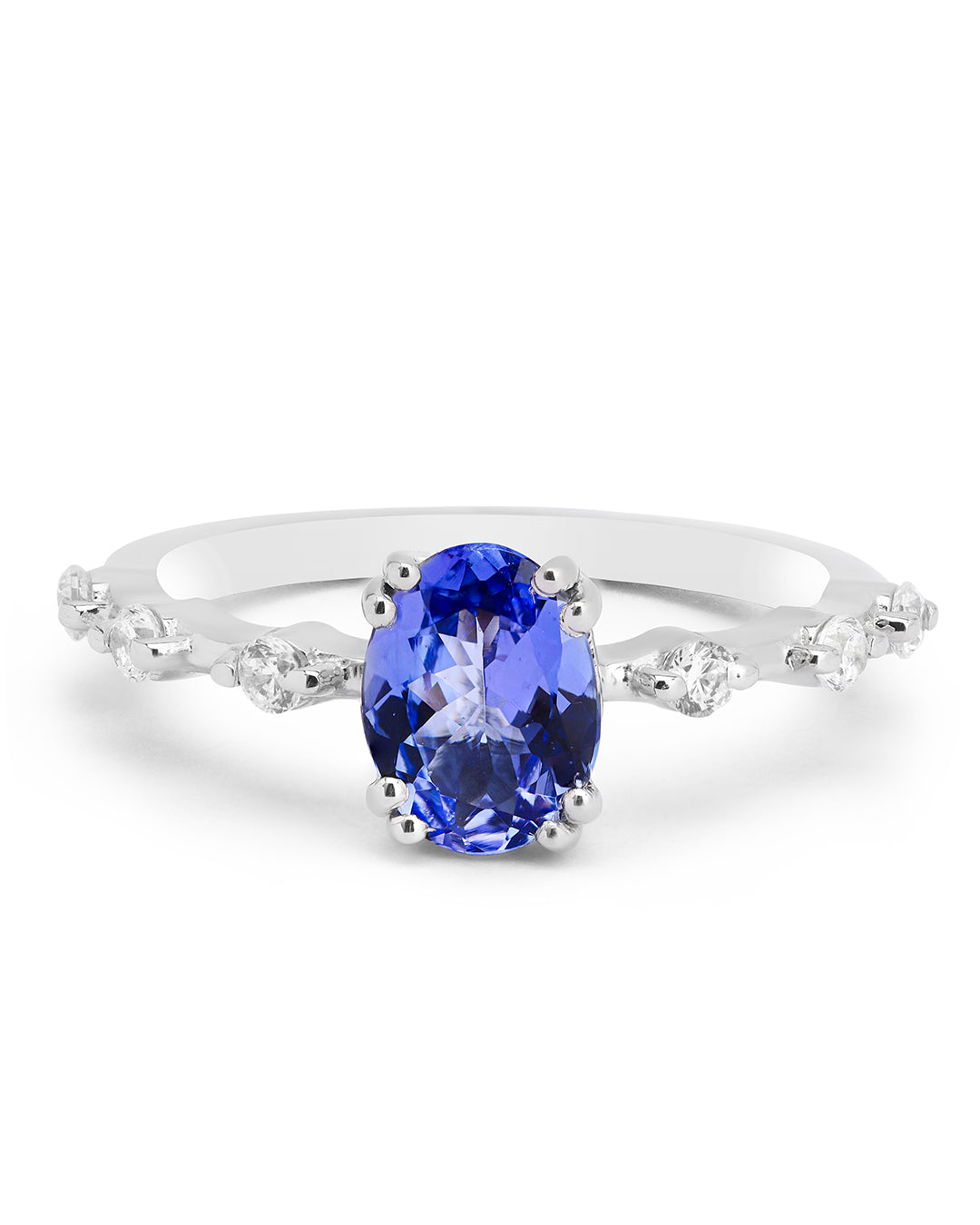 Elegant gemstone ring in sterling silver with intricate detailing.