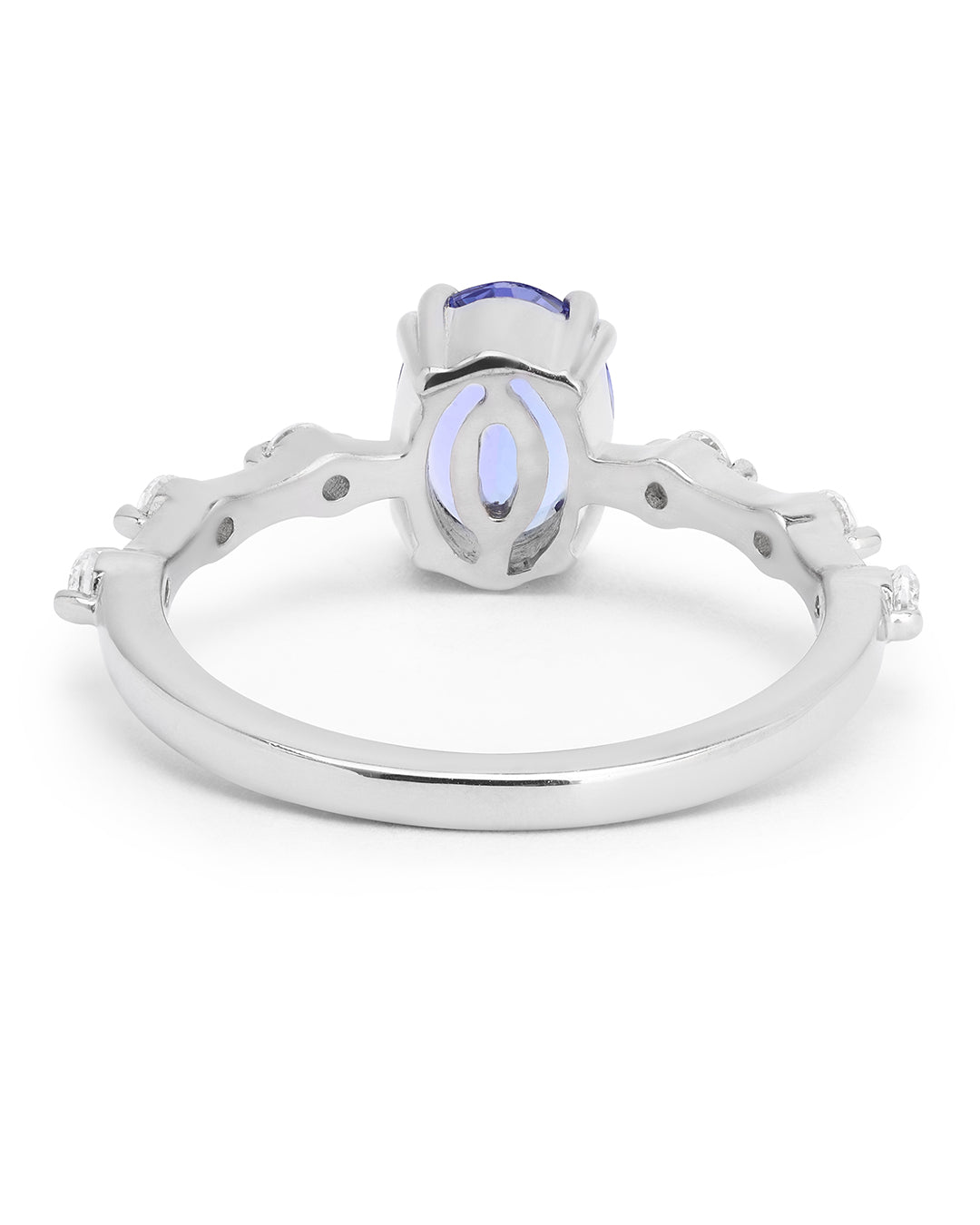 Elegant gemstone ring in sterling silver with intricate detailing.
