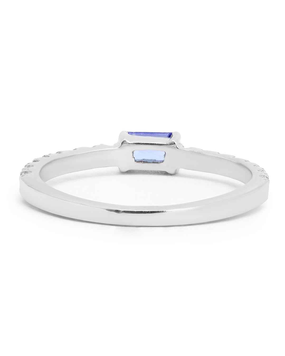Elegant gemstone ring in sterling silver with intricate detailing.