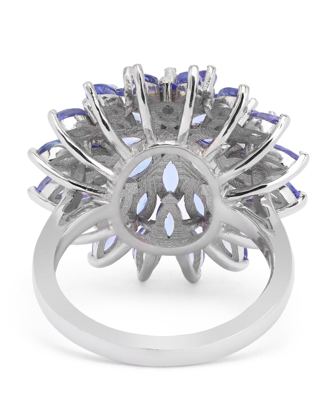 Elegant gemstone ring in sterling silver with intricate detailing.