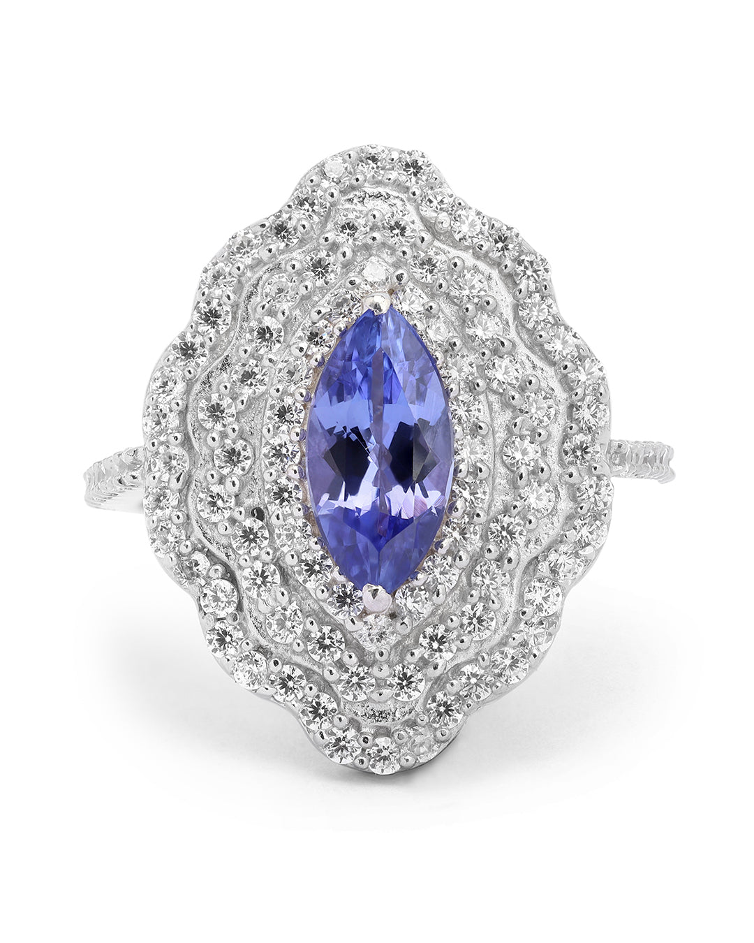 Elegant gemstone ring in sterling silver with intricate detailing.