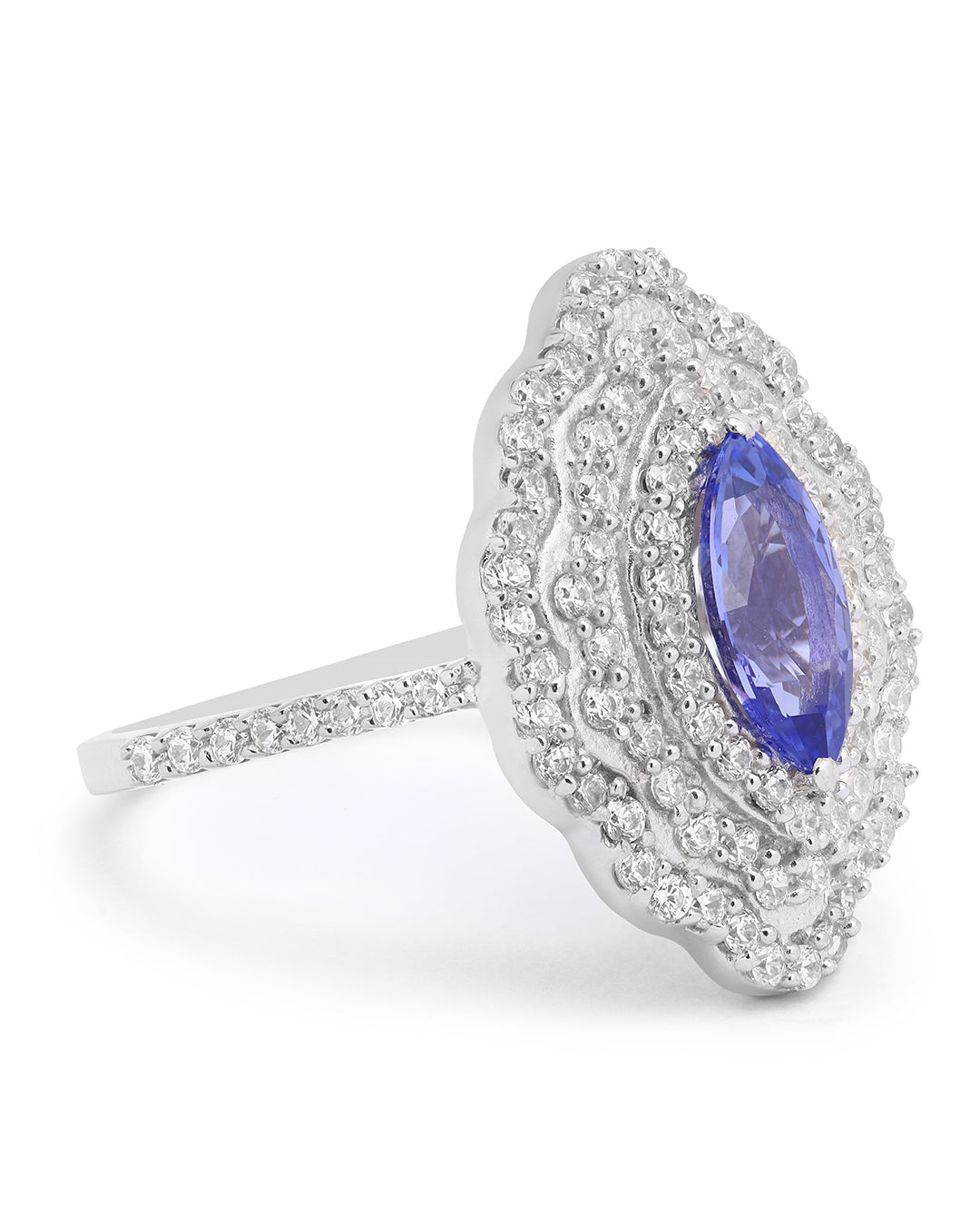 Elegant gemstone ring in sterling silver with intricate detailing.