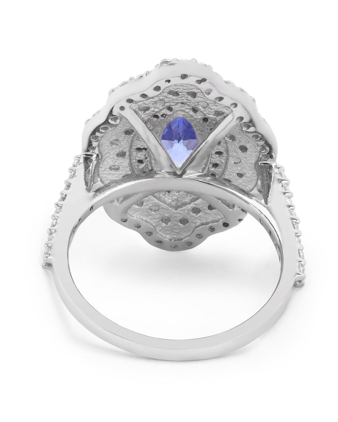 Elegant gemstone ring in sterling silver with intricate detailing.