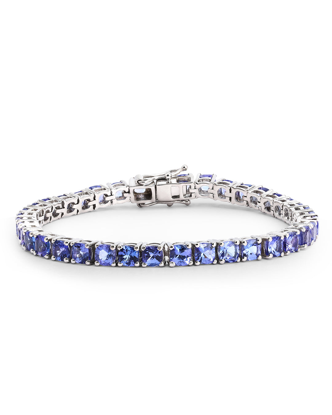 Elegant tennis bracelet with cushion-cut gemstones in fine metal.