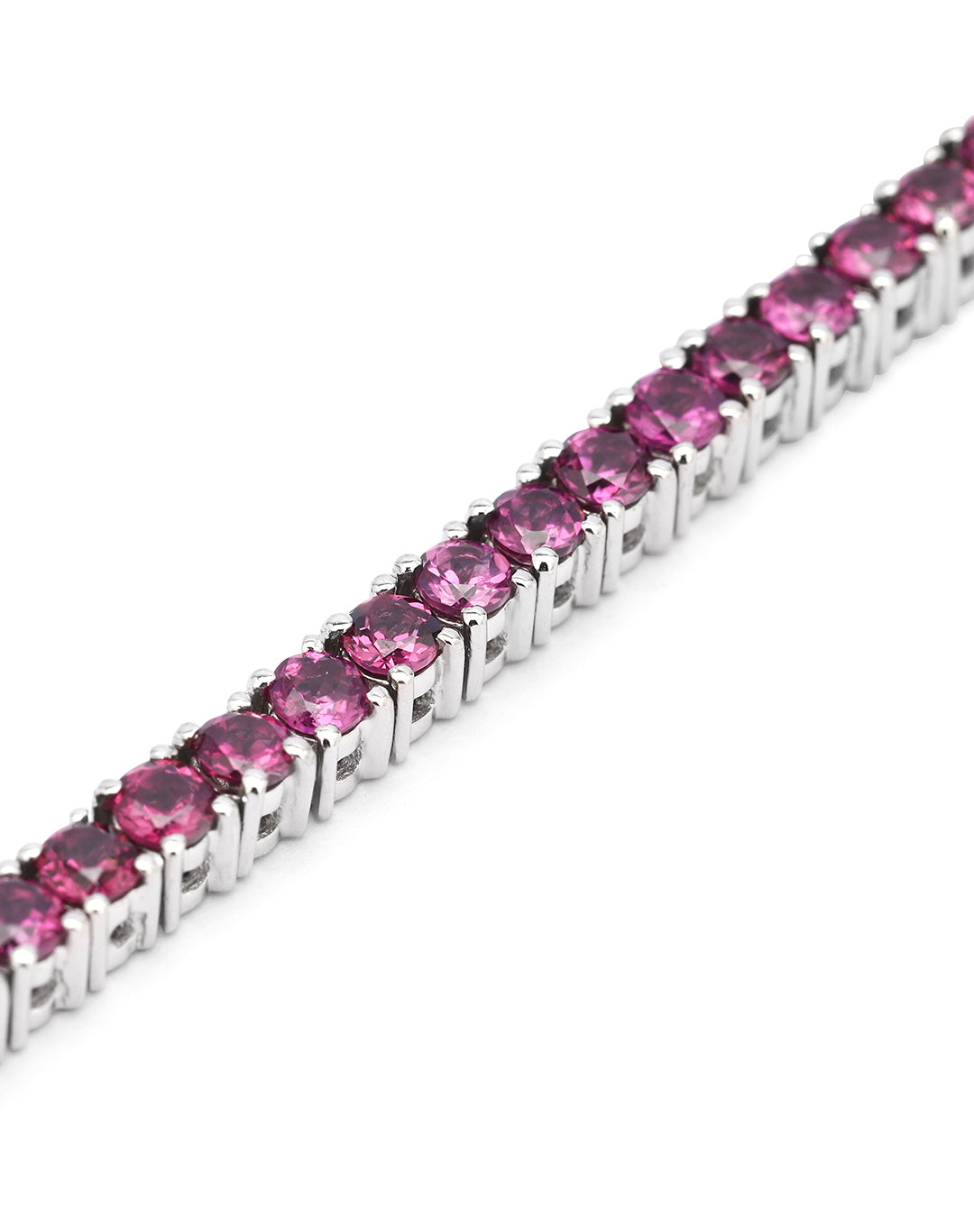 Elegant tennis bracelet with round-cut gemstones in fine metal.
