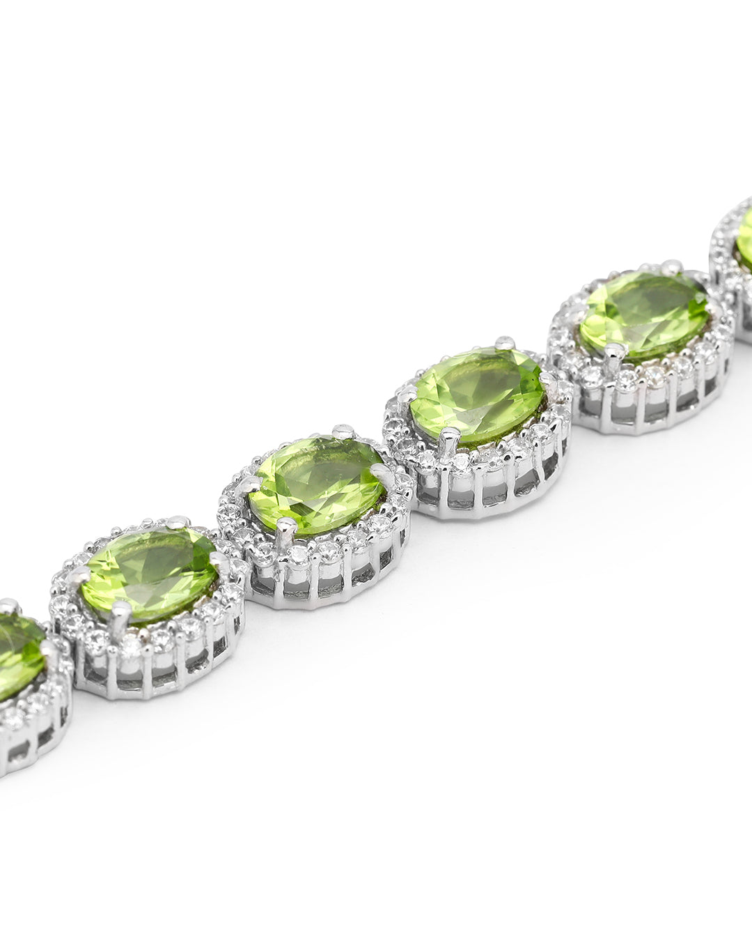 Elegant Halo link bracelet with oval-cut gemstones in fine metal.