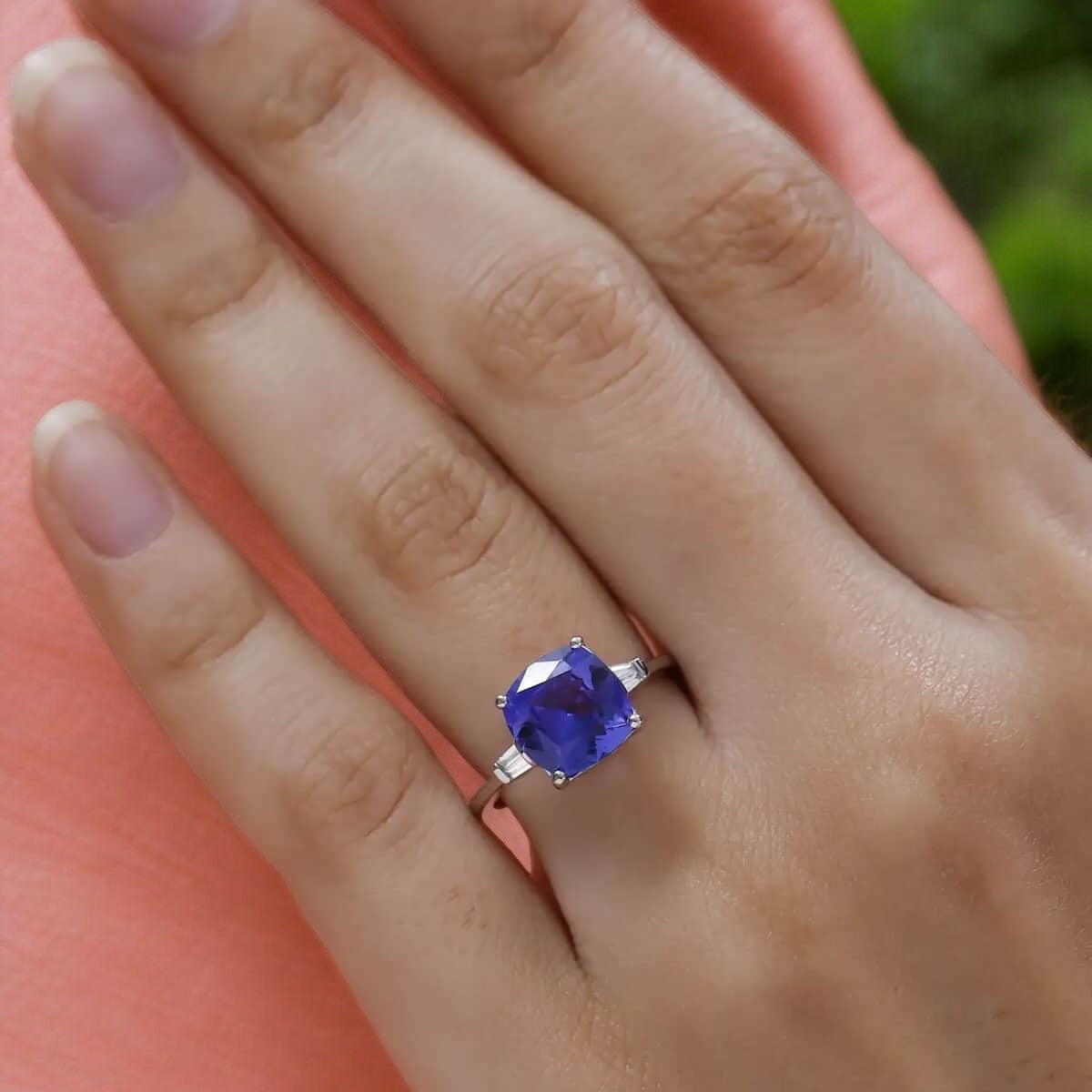 Classic Cushion Tanzanite and Moissanite Three-Stone Ring in Elegant Design