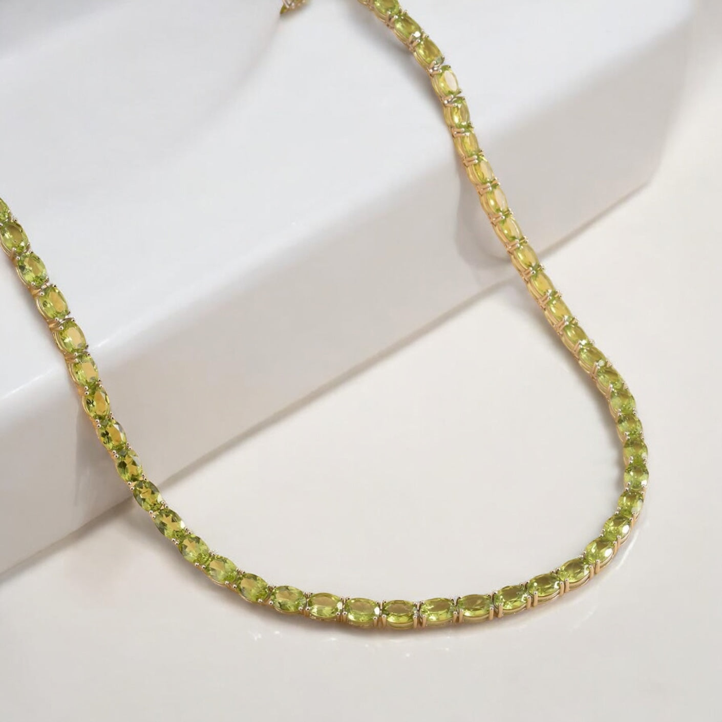 Luxury tennis necklace with sparkling gemstones set in silver.