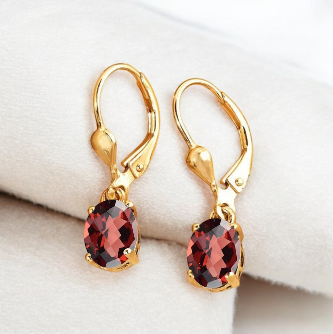 Oval Shaped Garnet Lever Back Earrings