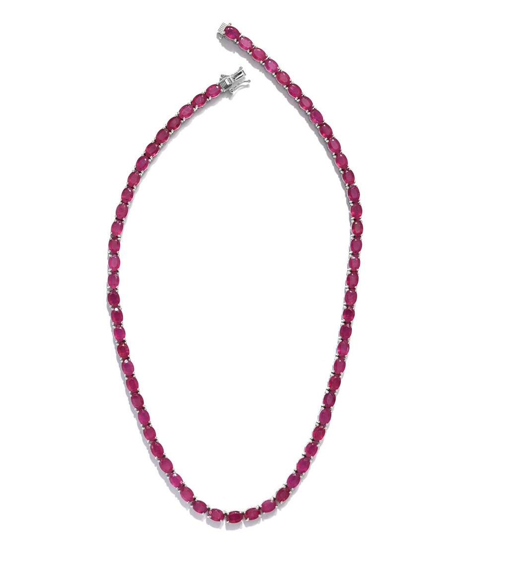Luxury tennis necklace with sparkling gemstones set in silver.