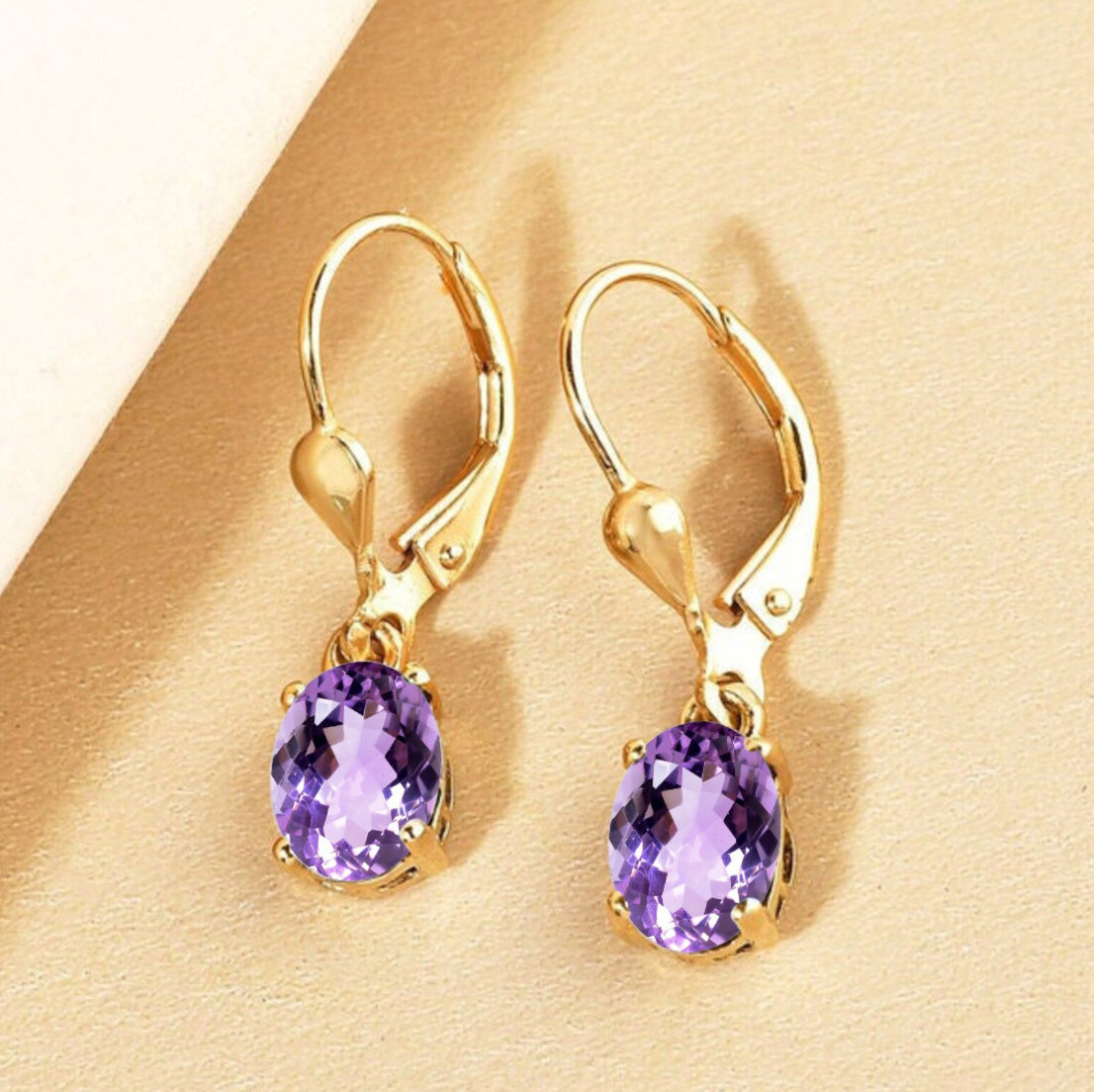 Classic Leverback earrings in 14K gold with a modern touch.