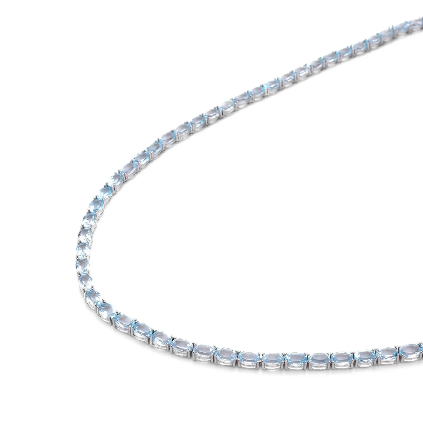 Luxury tennis necklace with sparkling gemstones set in silver.