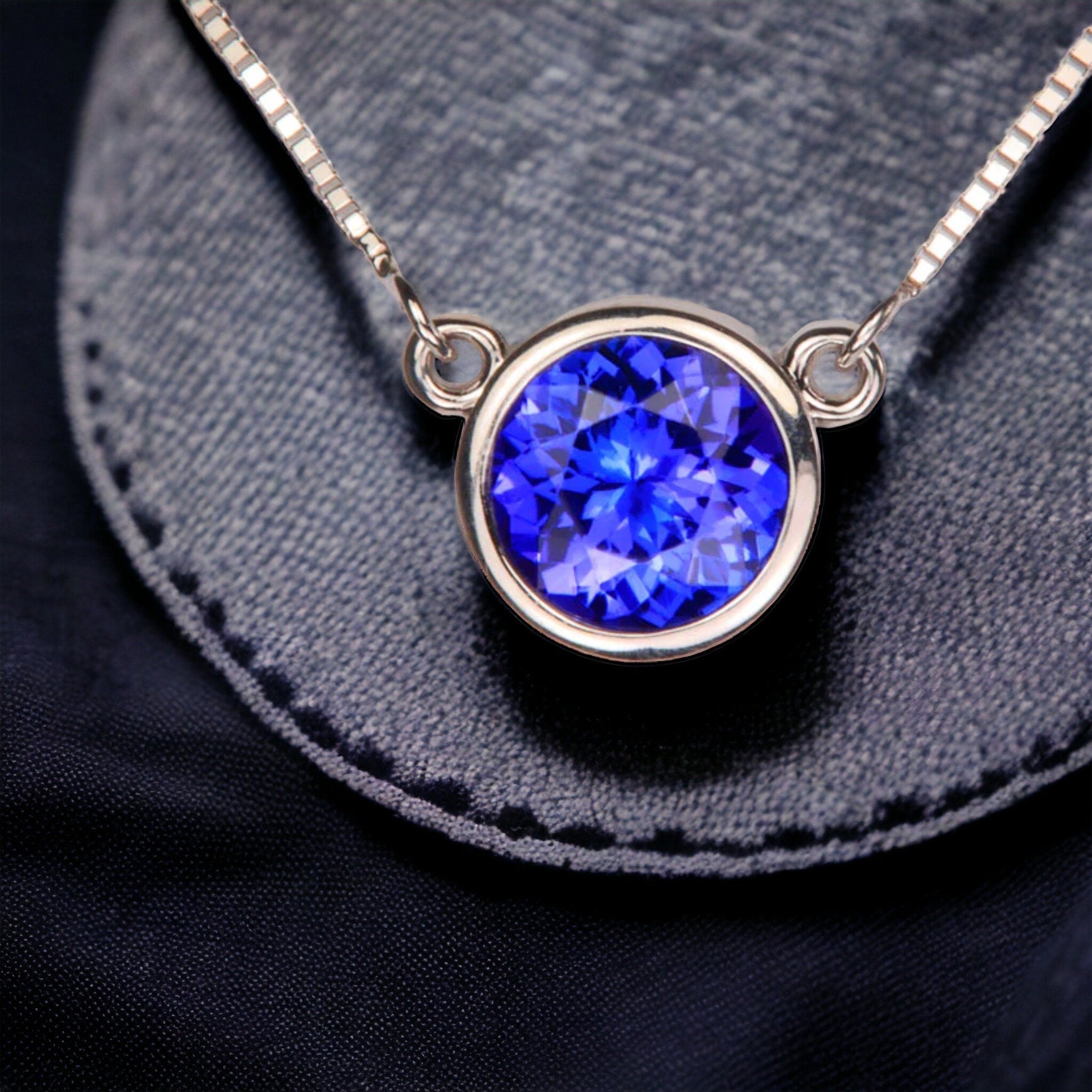 Timeless Round Tanzanite Solitaire Pendant with Bezel Setting for Everyday Sophistication