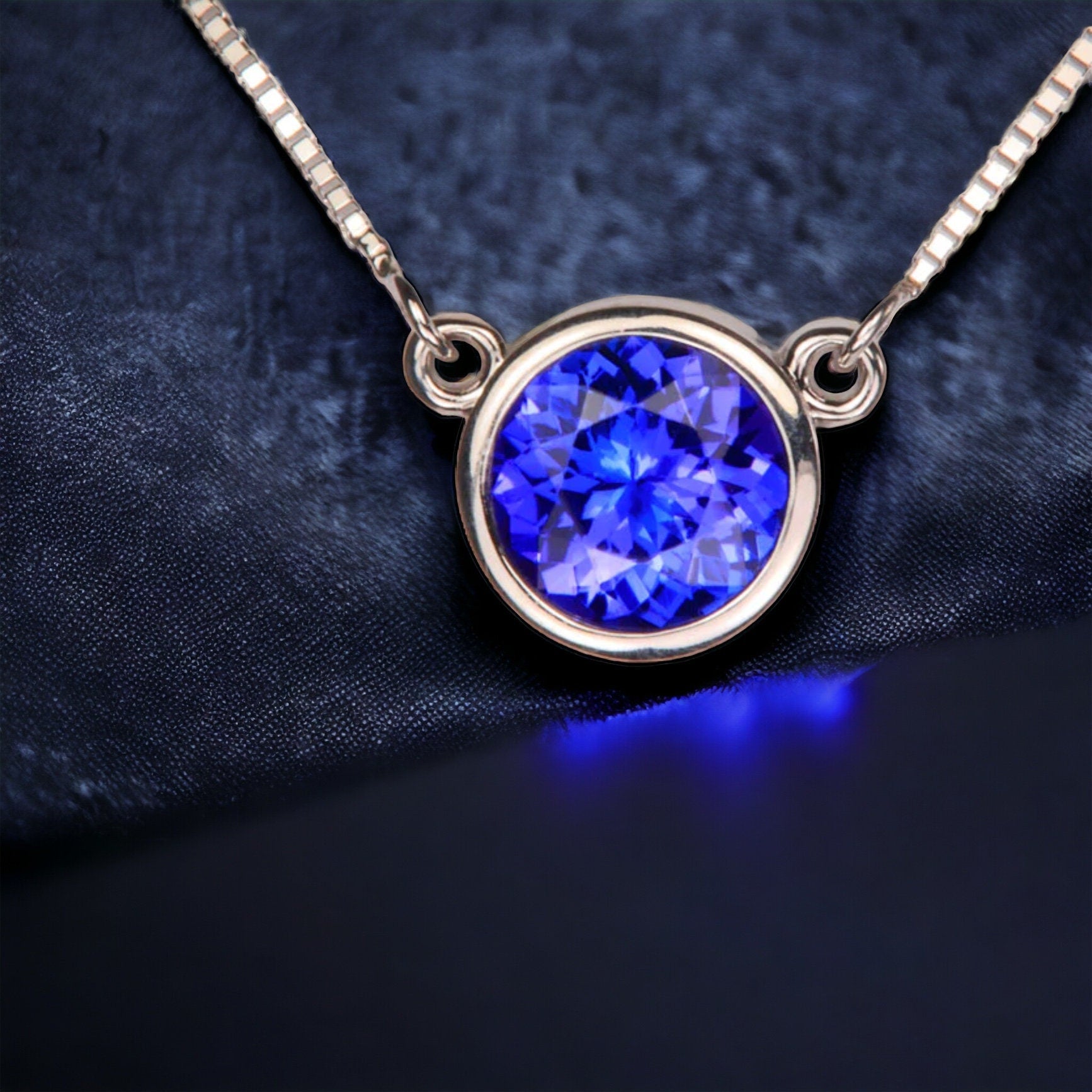 Elegant Bezel-Set Round Tanzanite Solitaire Pendant in Sterling Silver