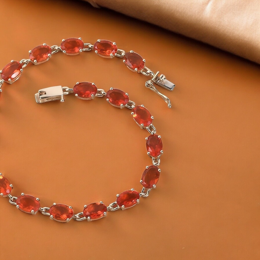 Elegant Fire Opal Tennis Link Bracelet Featuring Oval-Cut Gemstones