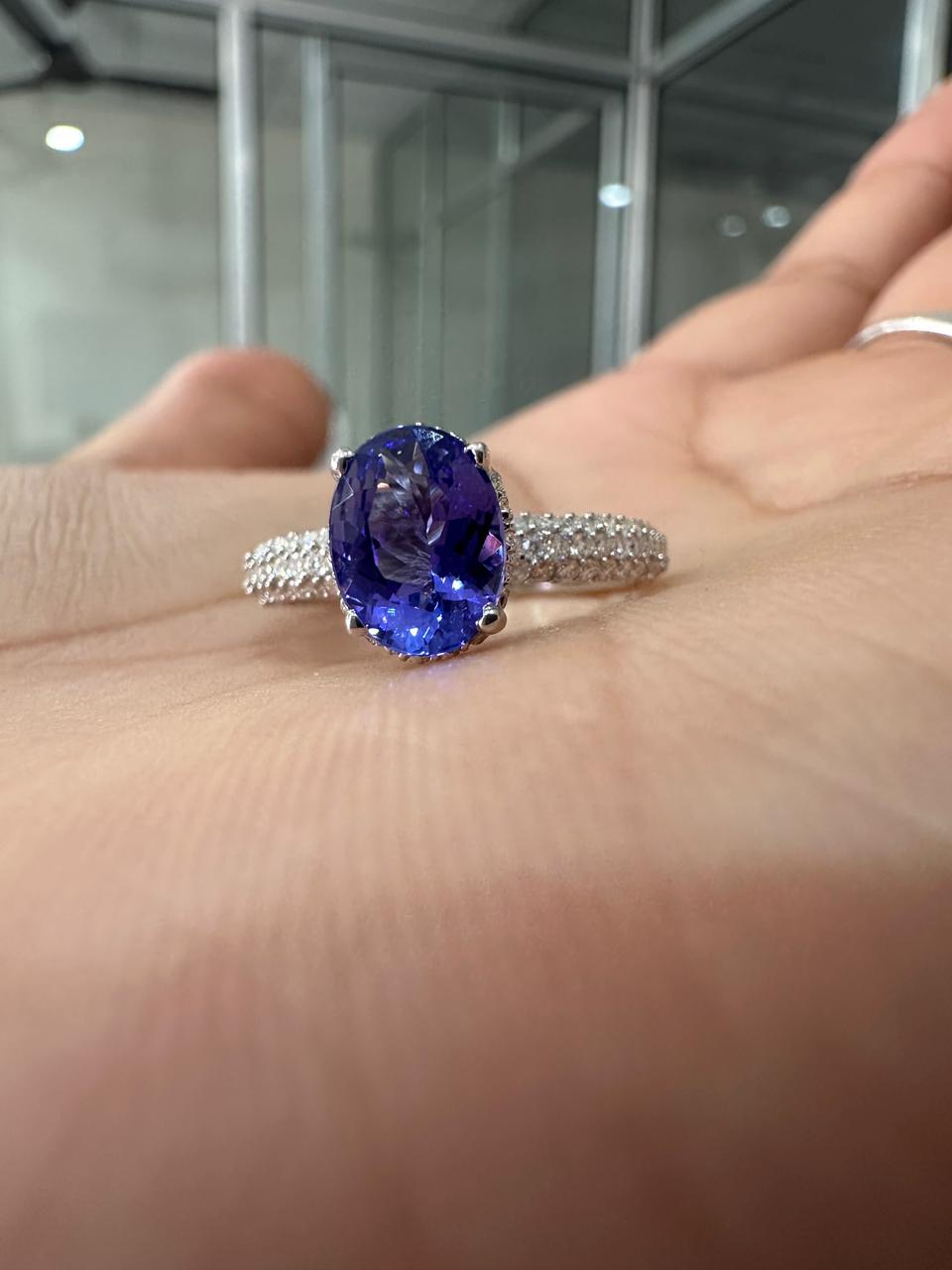 1.5 CT Oval Shape Tanzanite Hidden Halo Ring | 14K White Gold Pave Diamond Band