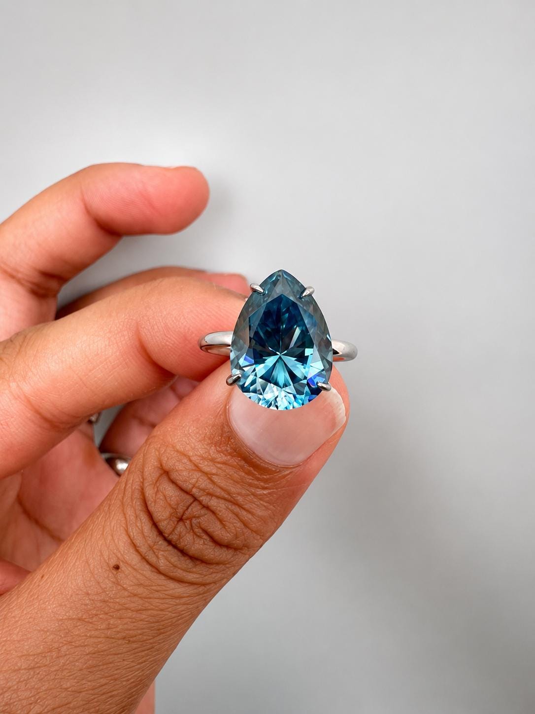 Pear cut Blue Moissanite Hidden Halo Engagement Ring | 14K White Gold, 7 Ct