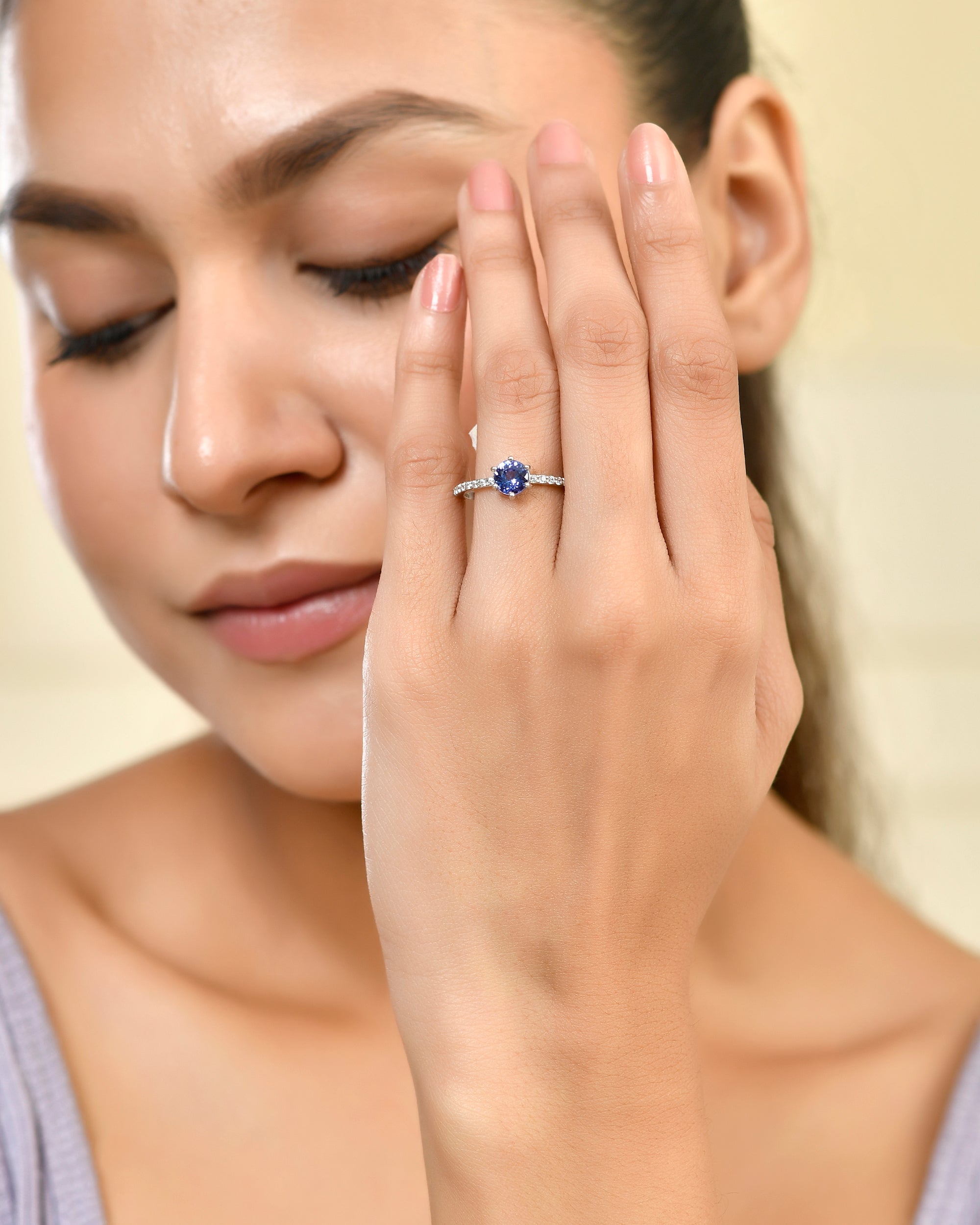 Six Prong-Set Tanzanite Ring with Moissanite Accents