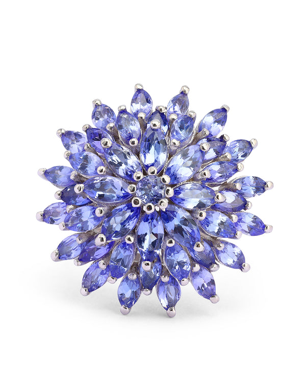Elegant gemstone ring in sterling silver with intricate detailing.