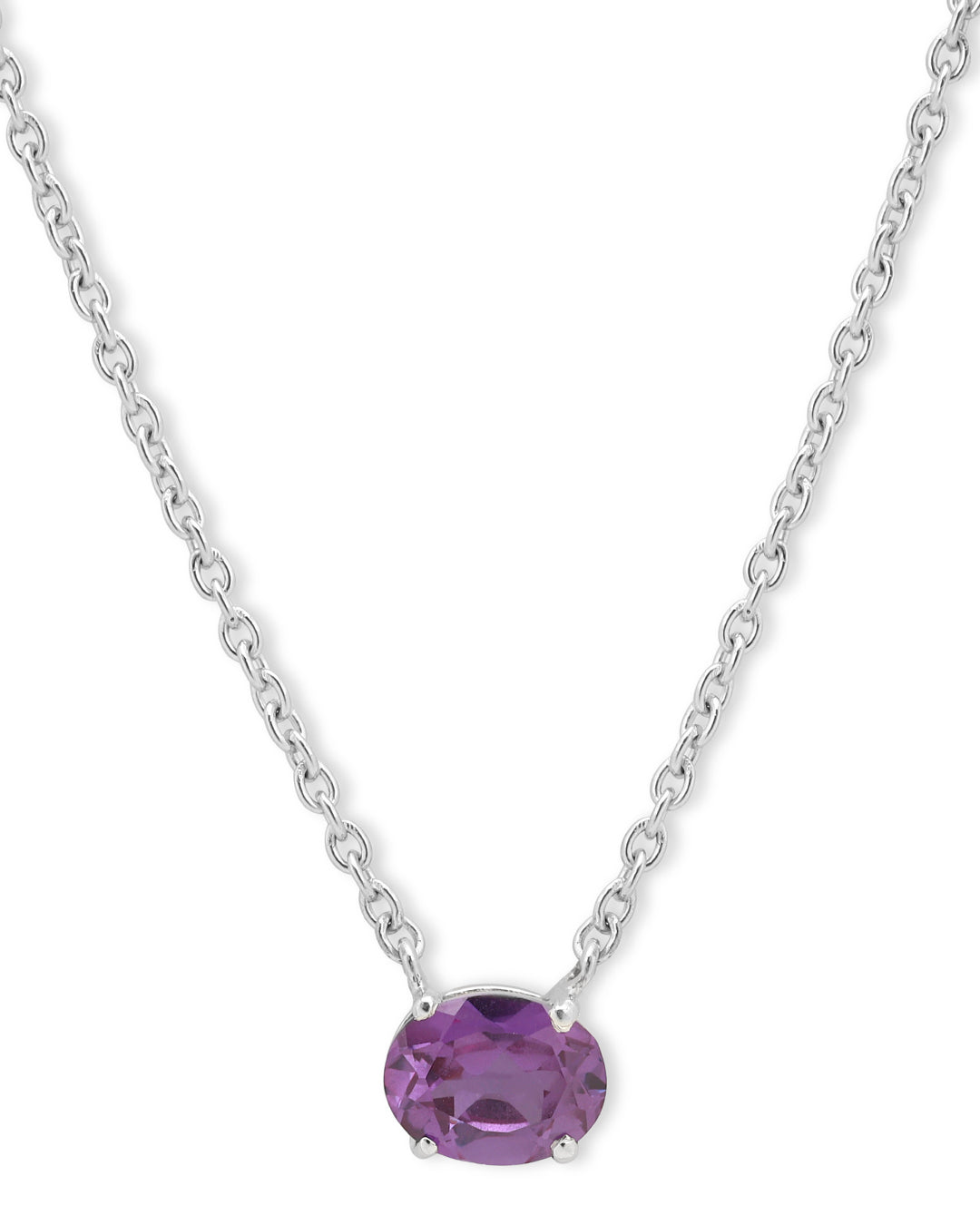 Timeless solitaire pendant with a oval-cut gemstone in a prong setting.