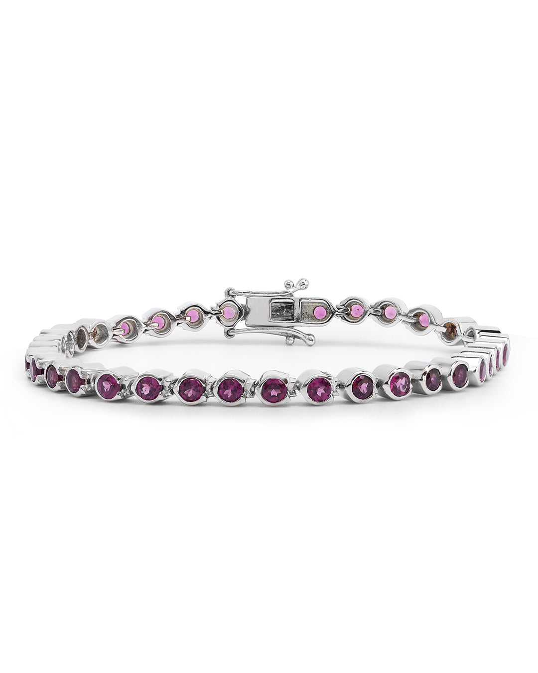 Elegant tennis bracelet with round-cut gemstones in fine metal.