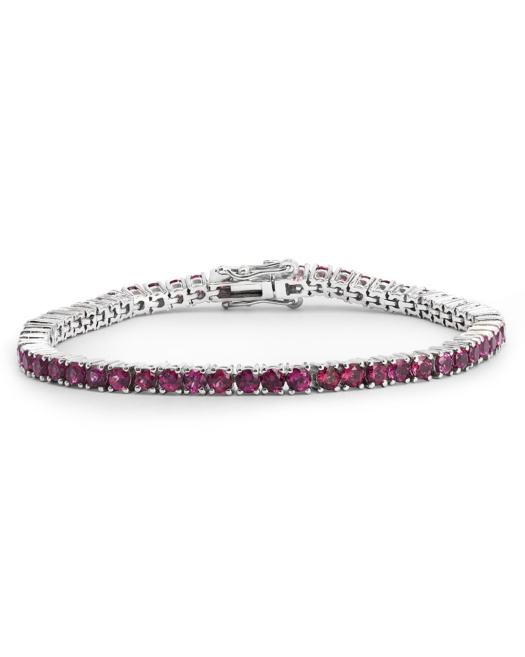 Elegant tennis bracelet with round-cut gemstones in fine metal.