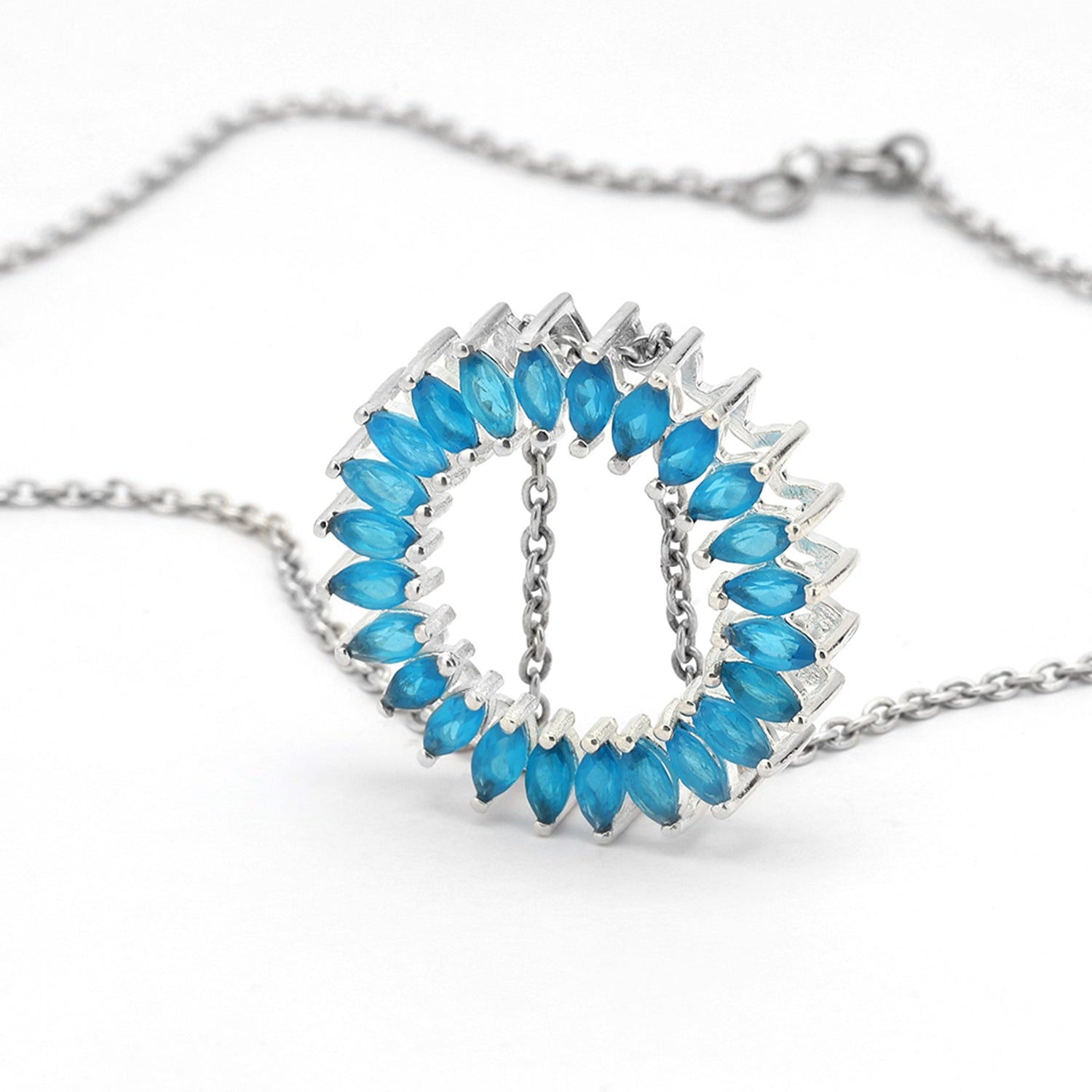 Unique pendant with a Marquise-cut gemstone in a prong setting.