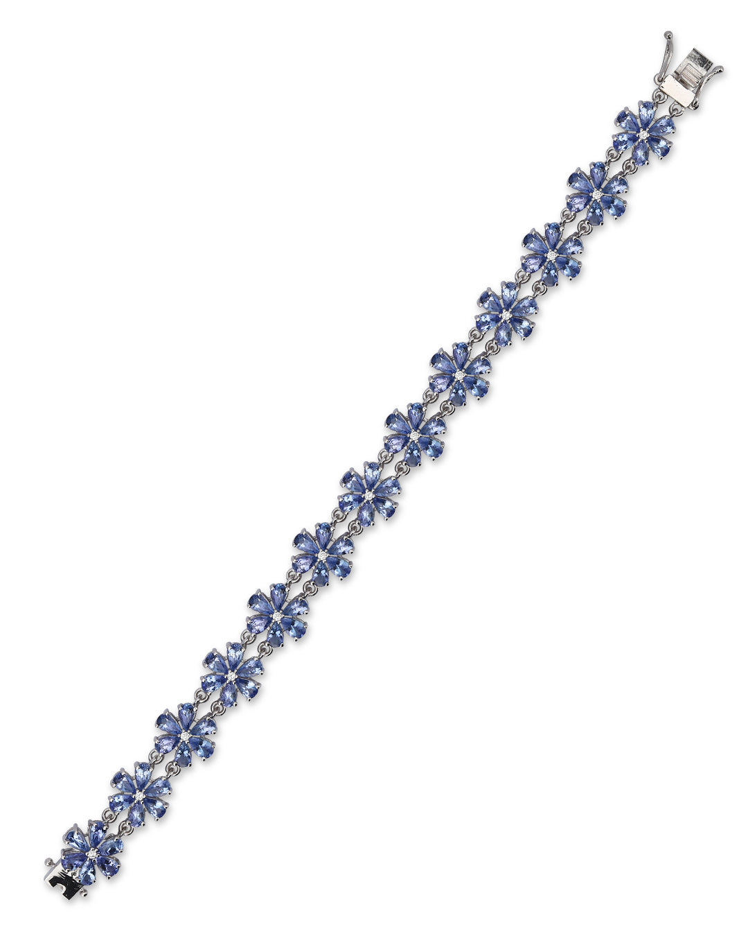 Elegant floral bunch bracelet with pear-cut gemstones in fine metal.
