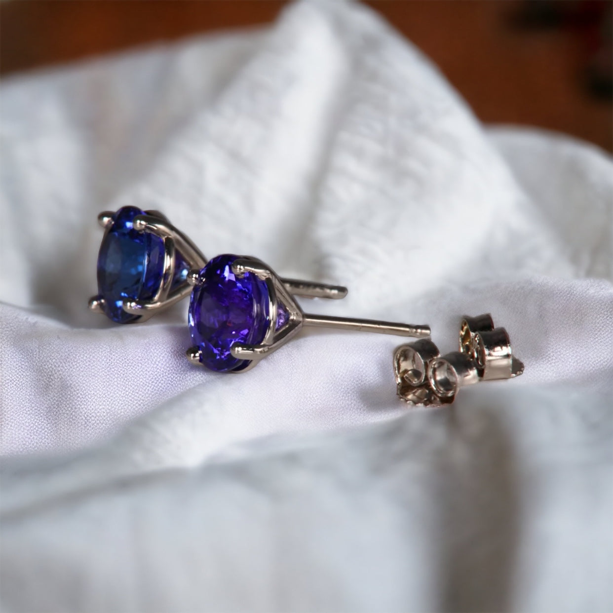 Vibrant Round Tanzanite Studs with Basket Setting, Perfect for Everyday Elegance