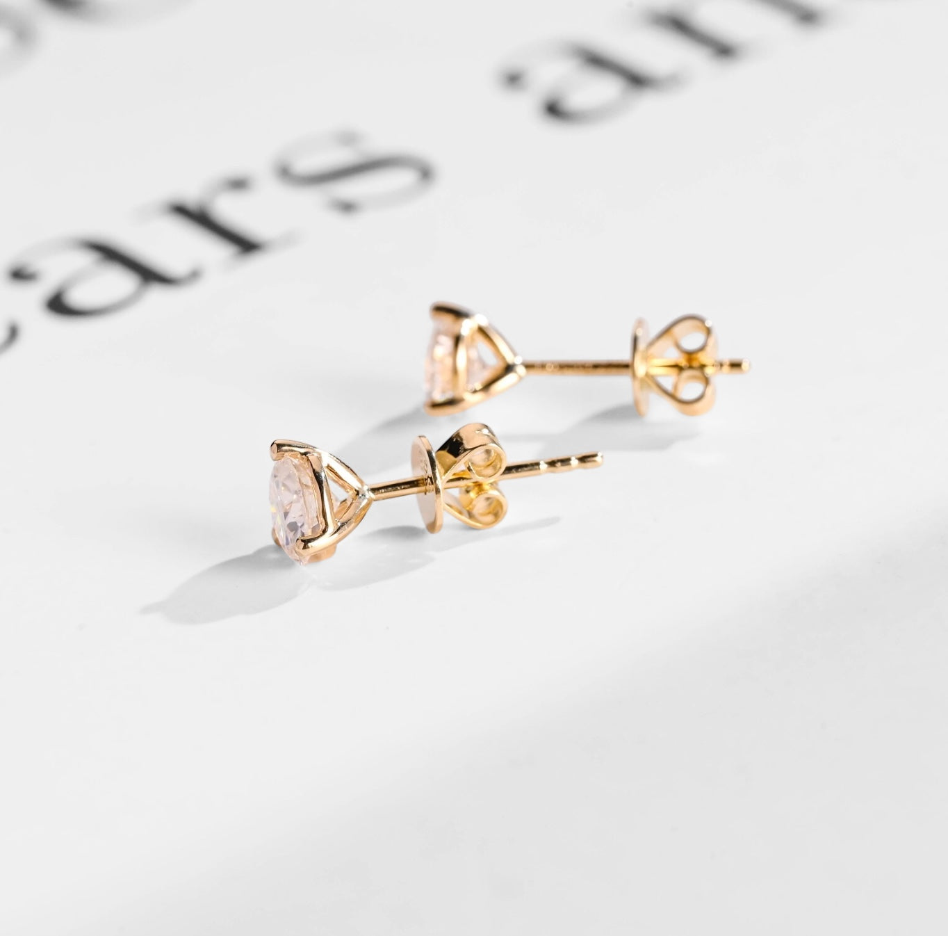 Three Prong Round Moissanite Stud Earrings