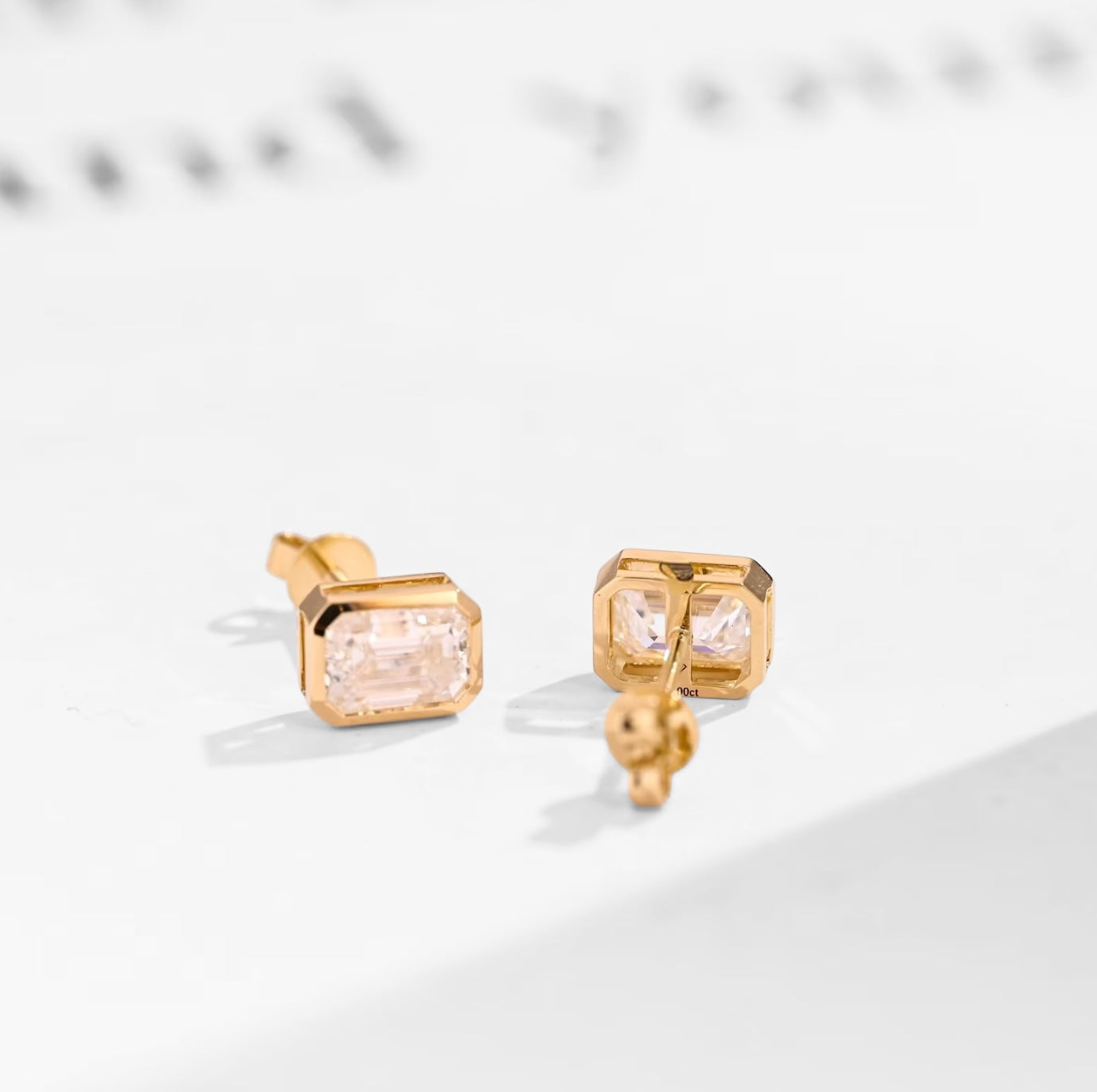 Bezel-Set Emerald-Cut Moissanite Solitaire Stud Earrings