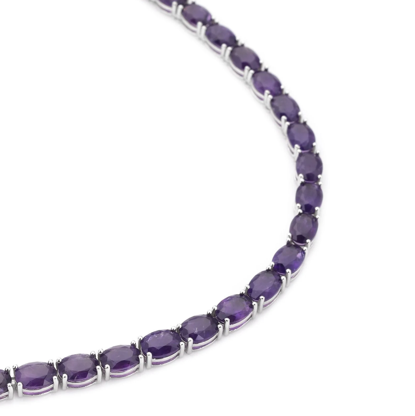 Luxury tennis necklace with sparkling gemstones set in silver.