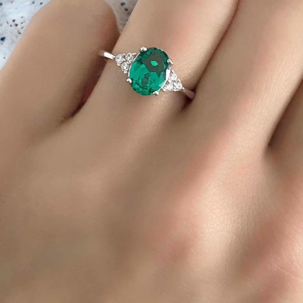Lab-Grown Solitaire Oval Emerald Ring with Trio Lab Created Accents