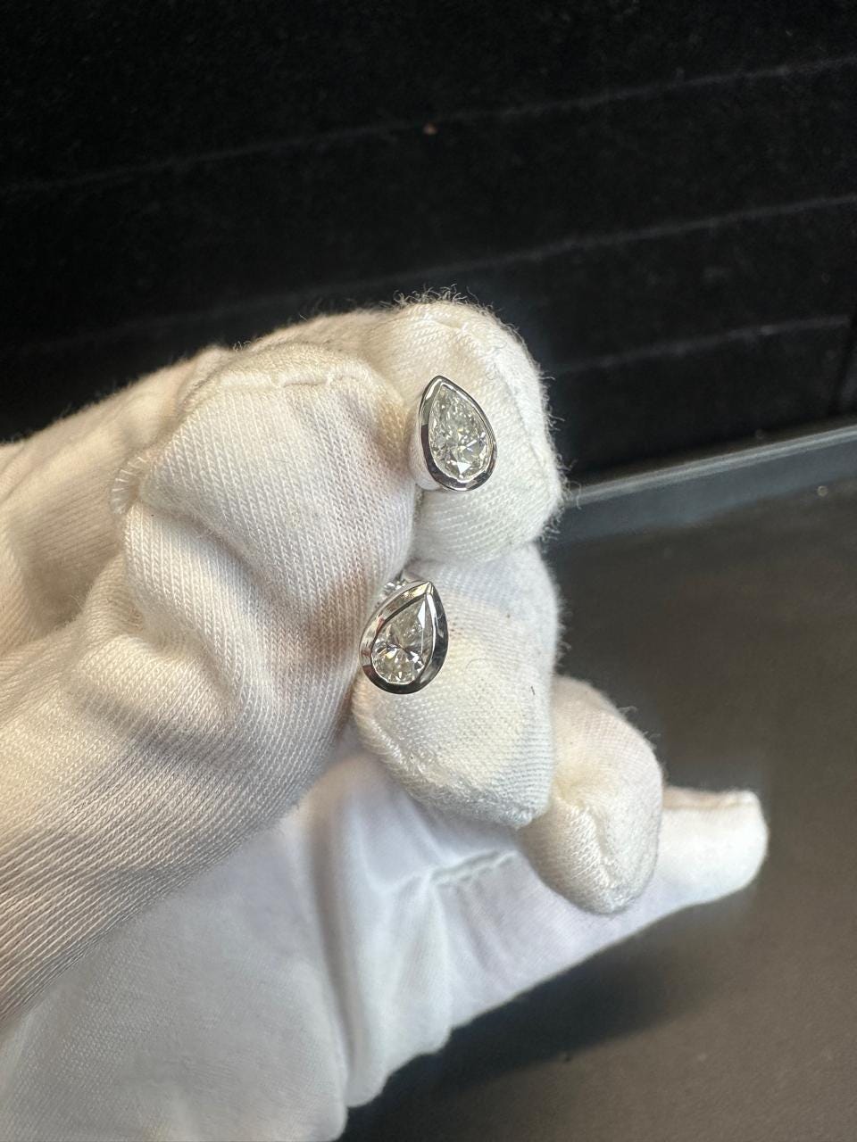 Pear Cut Moissanite Stud Earrings | Platinum Sterling Silver Bezel Set