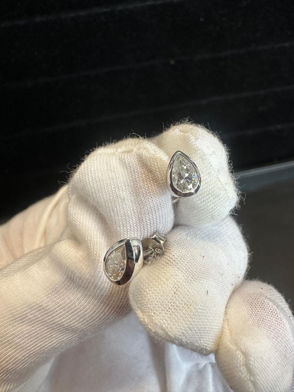 Pear Cut Moissanite Stud Earrings | Platinum Sterling Silver Bezel Set