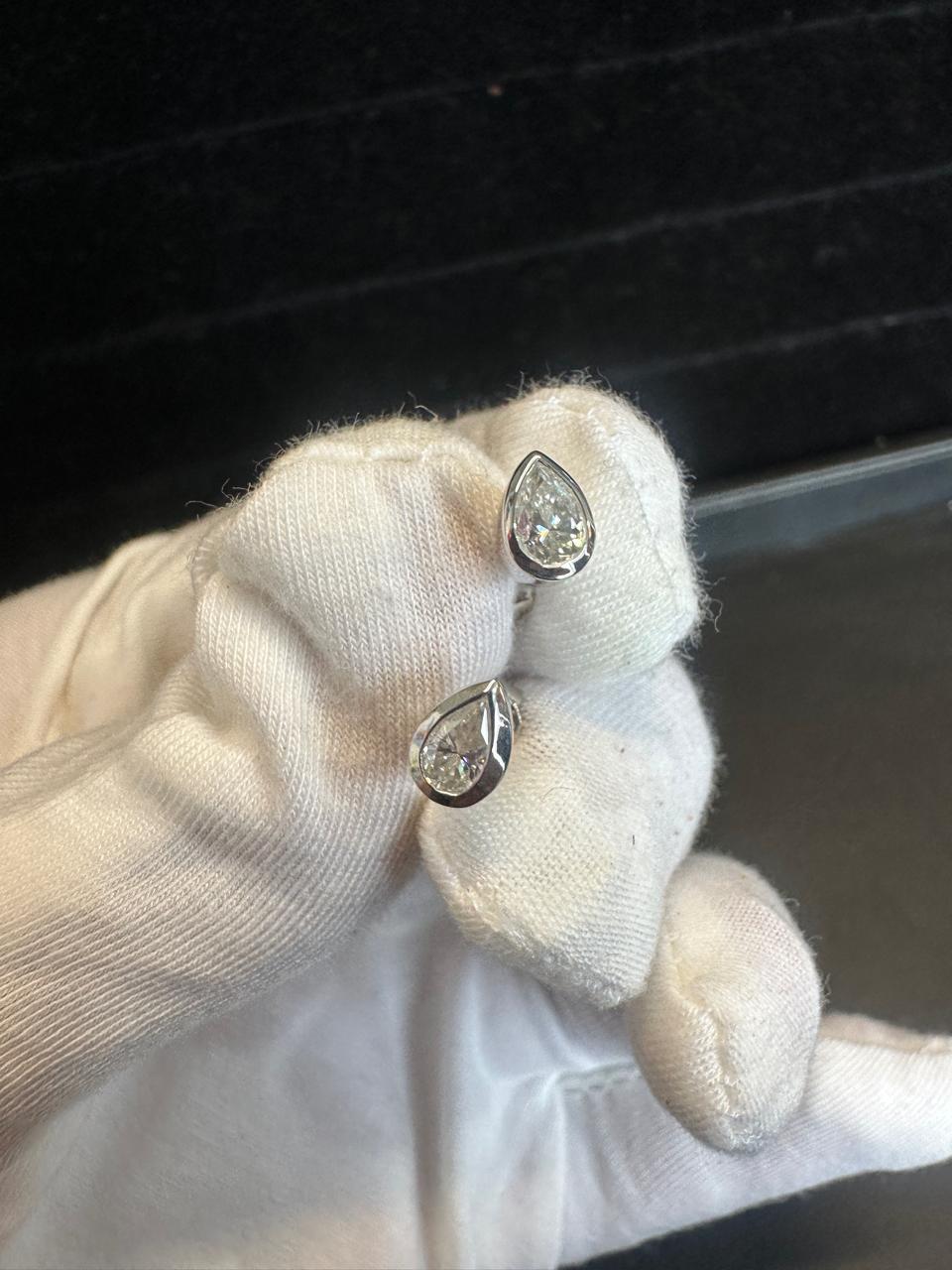 Pear Cut Moissanite Stud Earrings | Platinum Sterling Silver Bezel Set