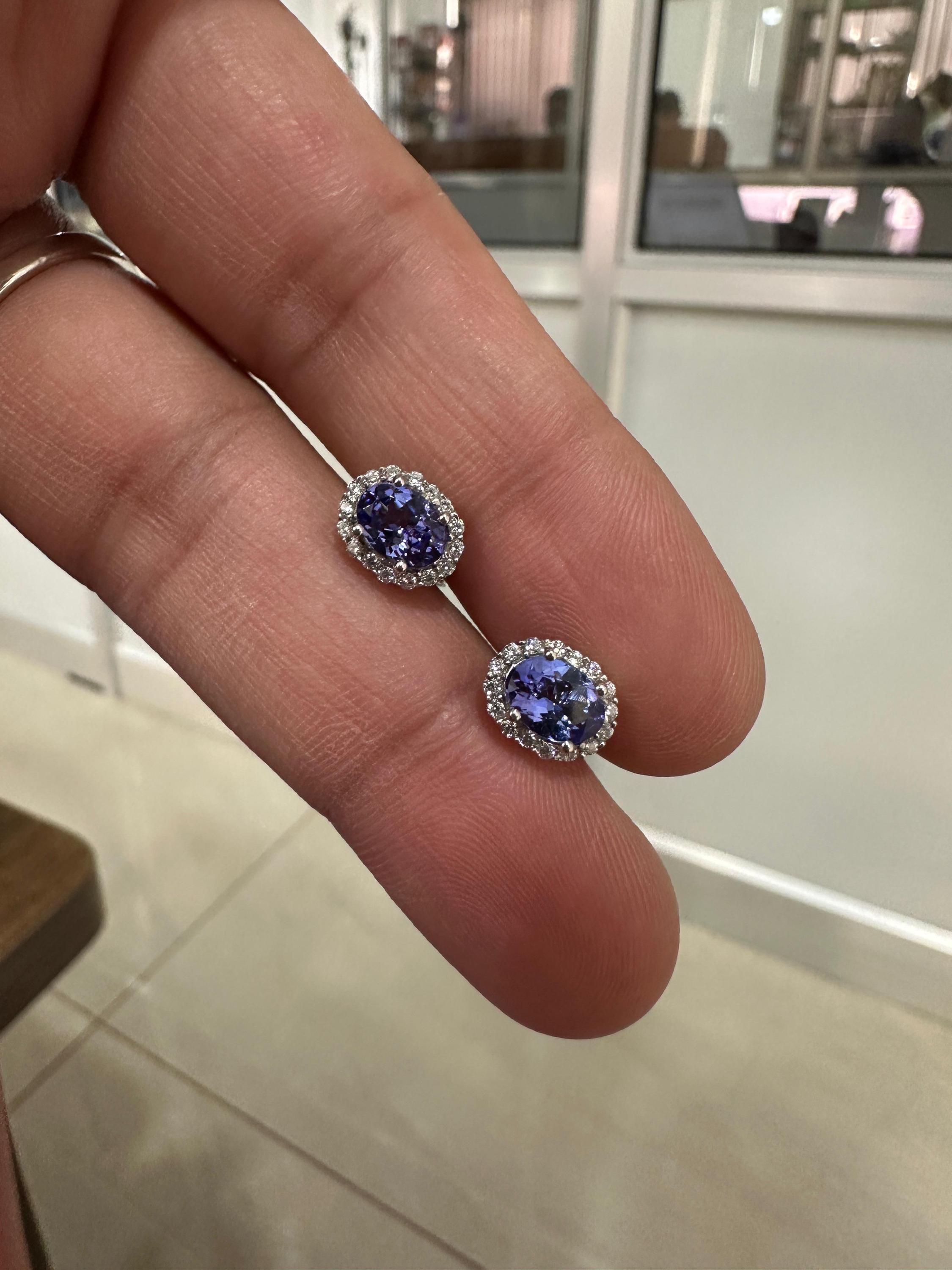 Oval Tanzanite Halo Stud Earrings | 14K White Gold, Moissanite Accents