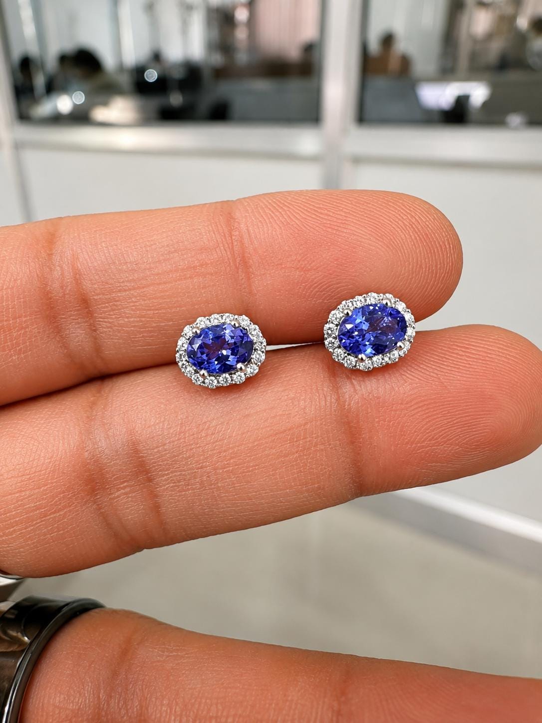 Oval Tanzanite Halo Stud Earrings | 14K White Gold, Moissanite Accents